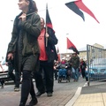 Purposeful_marcher_with_flag-thumb