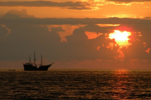 Pirate_ship_and_the_setting_sun__paul_hamilton-medium
